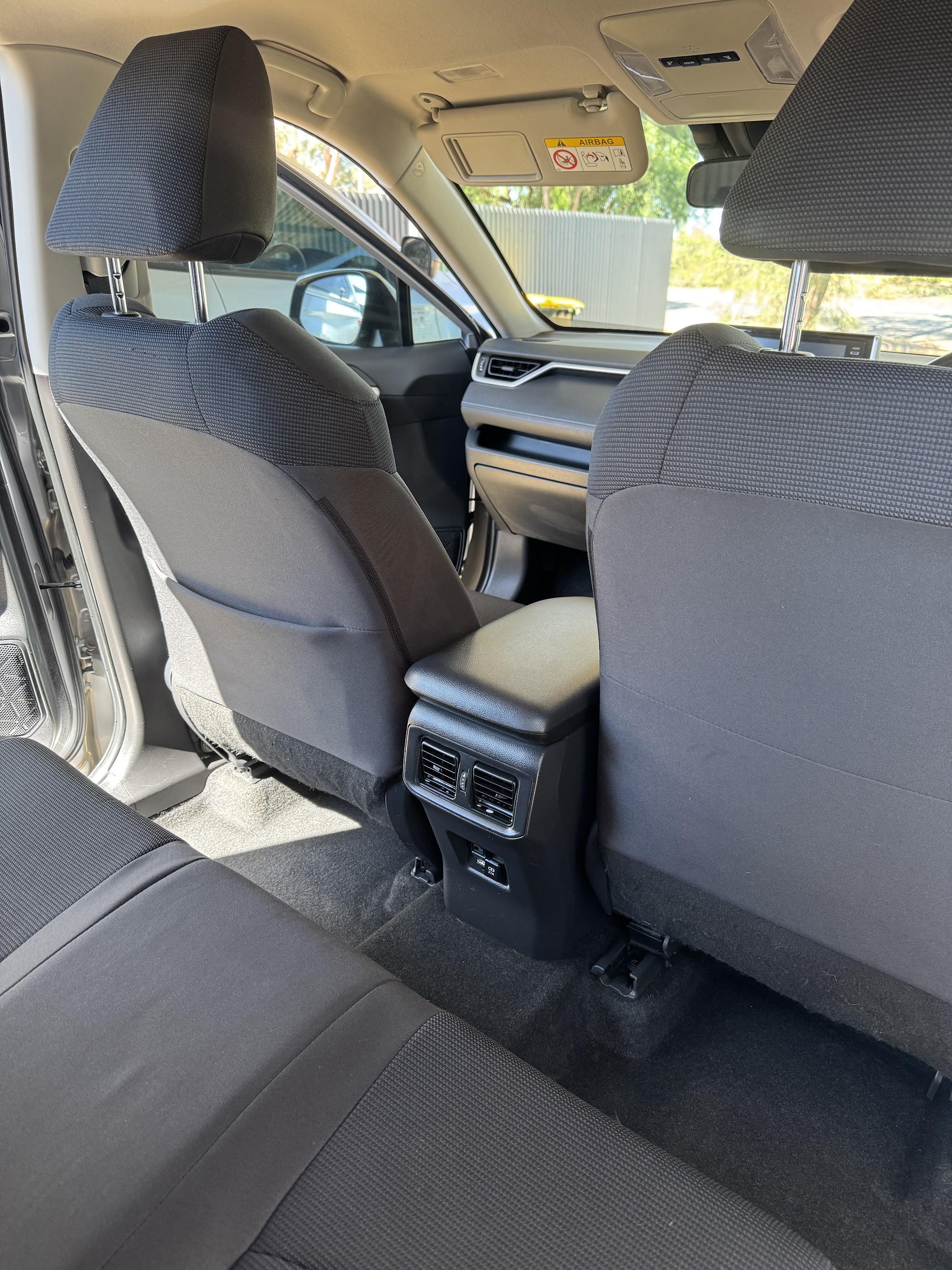 Vacuumed rear seats and carpets in a family car